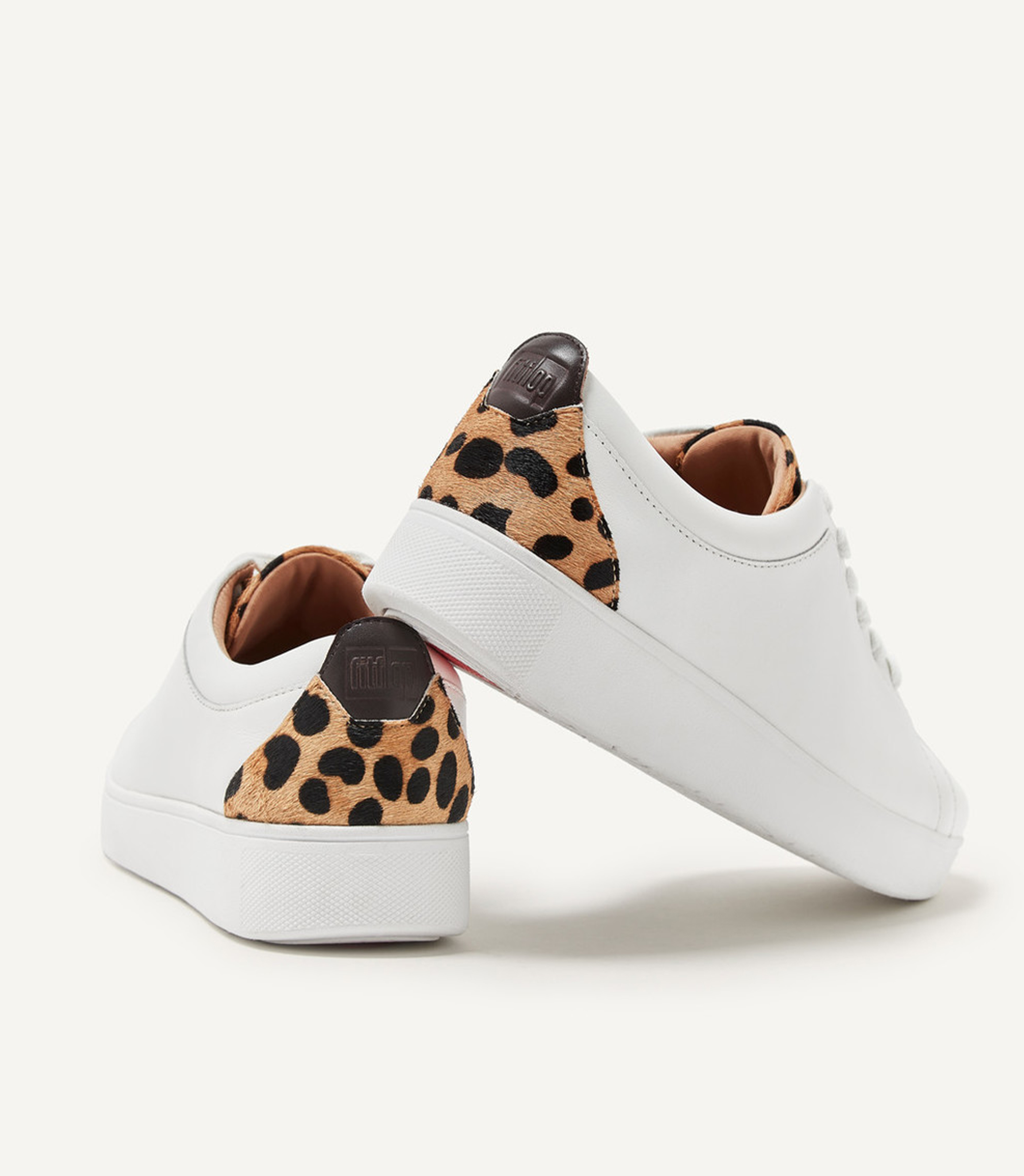 white sneakers with leopard back